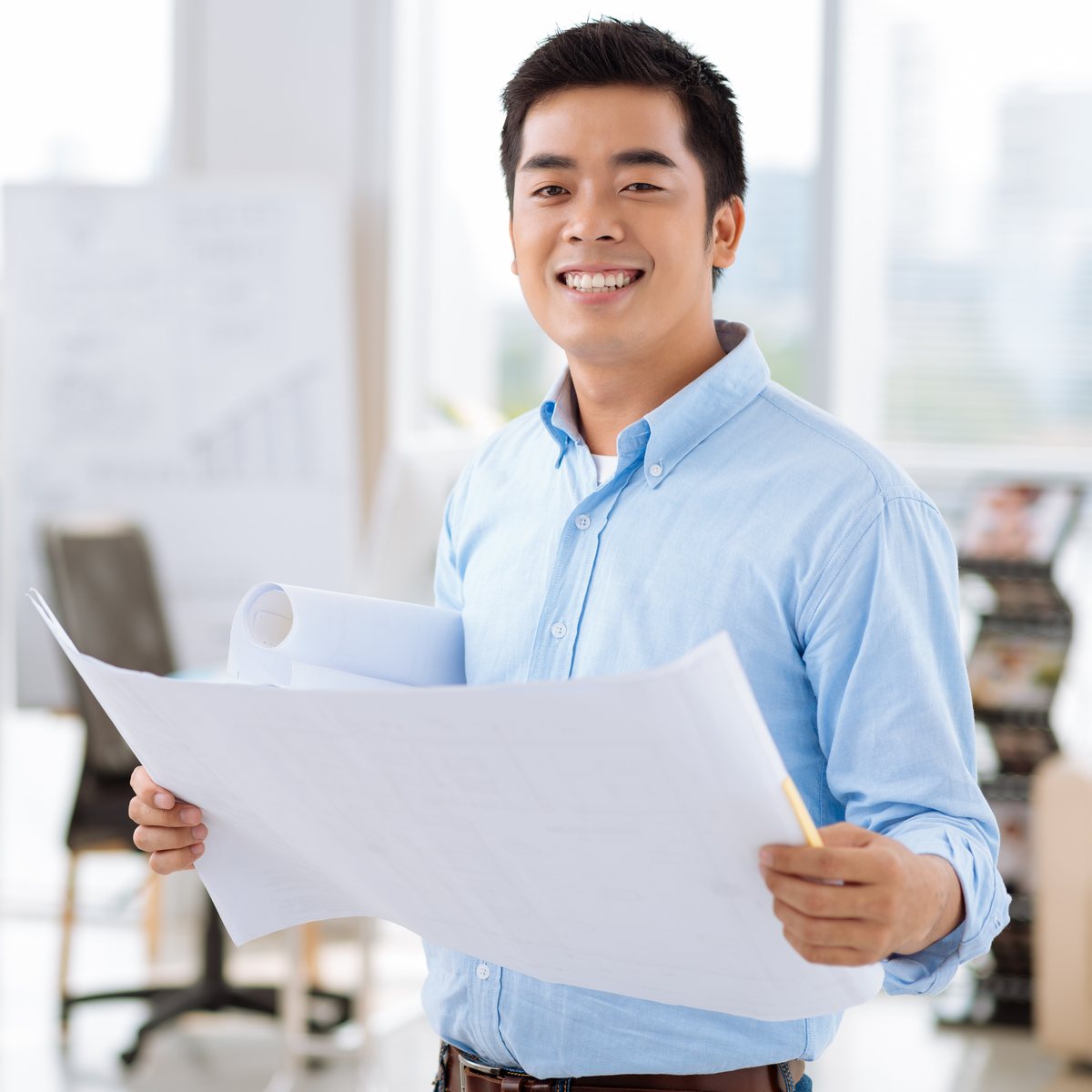 Design engineer reviewing a drawing